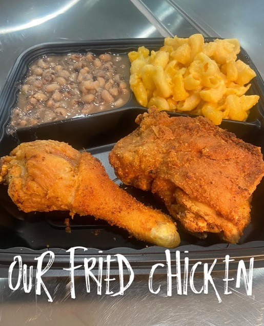 Plate of crispy fried chicken with sides