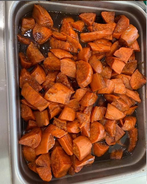 Shrimp po’boy sandwich with fries
